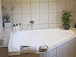 Beautifully tiled, en suite bathrooms