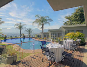 Stunning sparkling pool with wooden deck