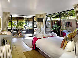 Sandals Guest House has ten large en-suite luxury bedrooms, all with baths, showers and extra length beds.